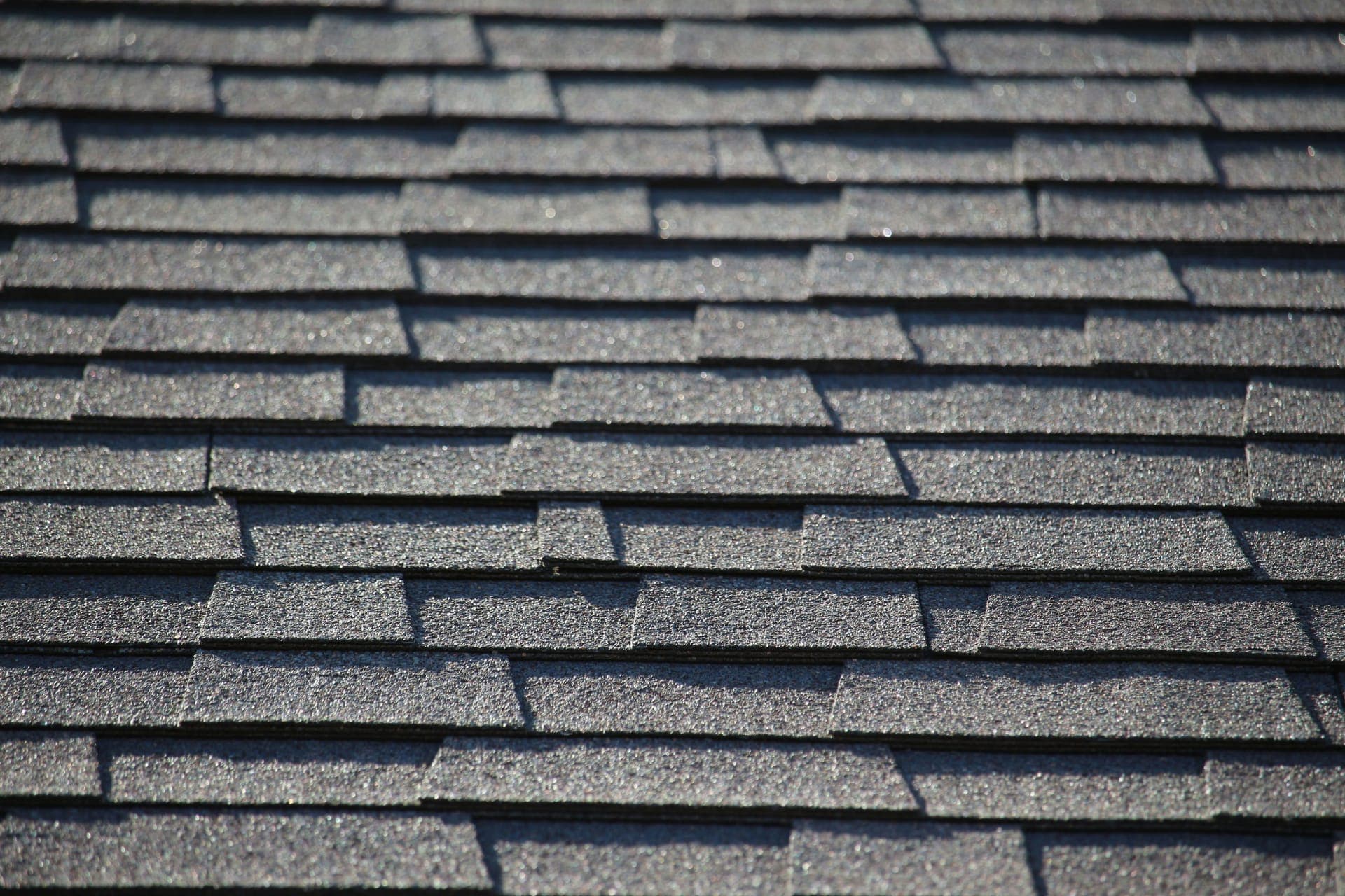 Close-up of dark gray asphalt shingle roofing